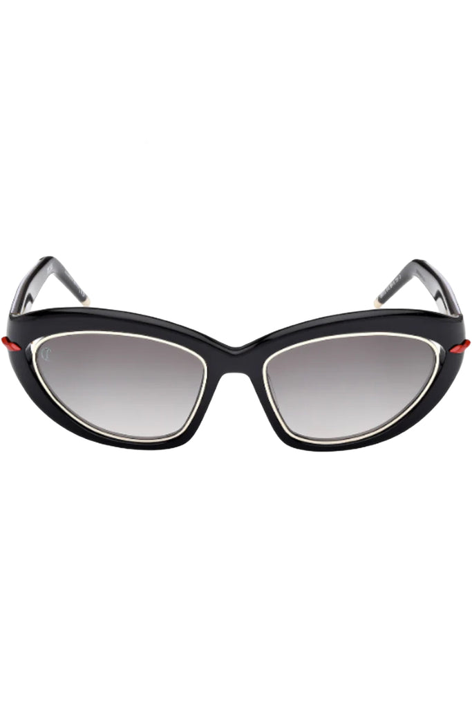 Christian Louboutin cat-eye sunglasses in gray with black frame, red details and metal frame around the lenses, shown against a plaid white background.