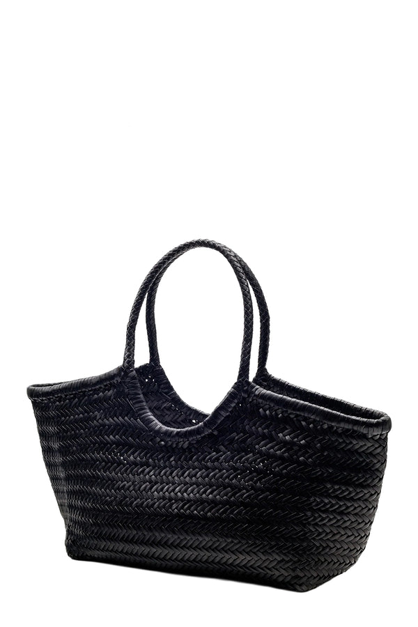Rotated view of Dragon Diffusion oval woven leather tote bag in black, shown against a plain white background.