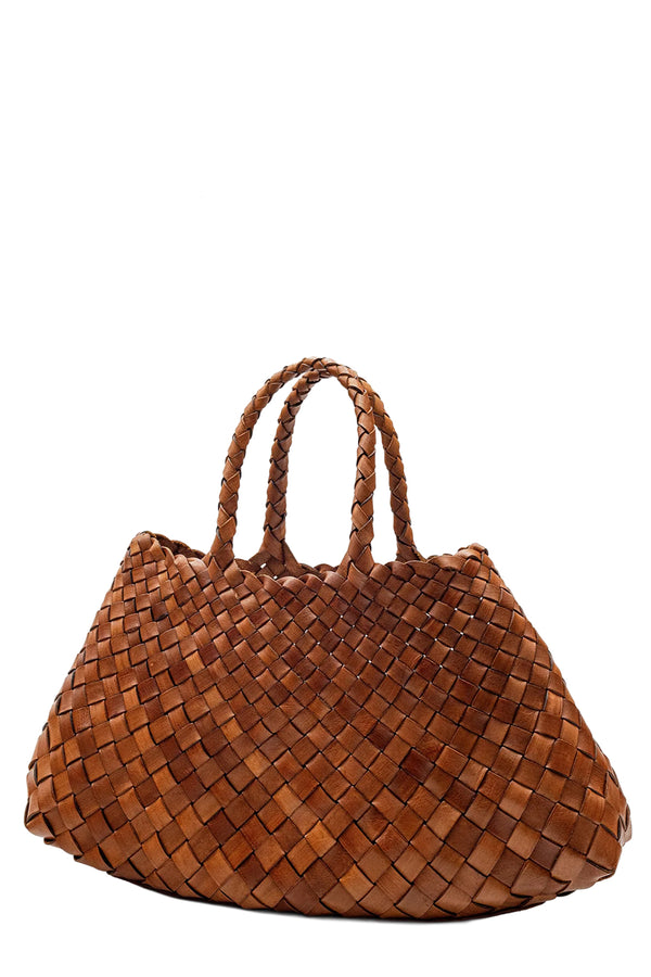 Rotated view of Dragon Diffusion woven leather tote bag in light brown, shown against a plain white background.