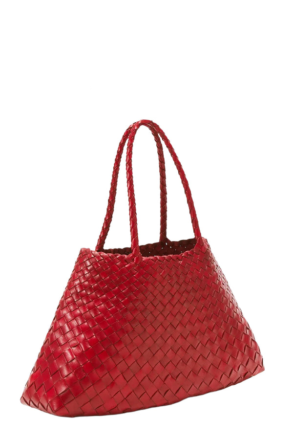 Rotated view of Dragon Diffusion woven leather tote bag in red, shown against a plain white background.