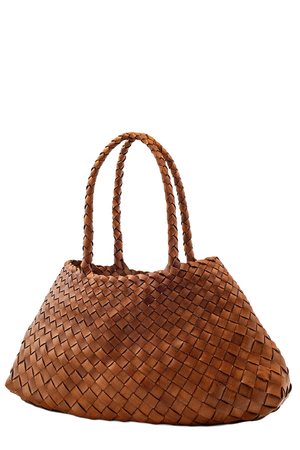 Rotated view of Dragon Diffusion woven leather tote bag in light brown, shown against a plain white background.