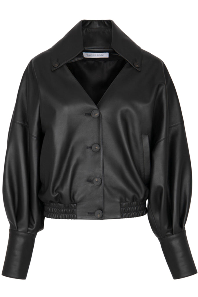 Raquel Diniz leather  jacket in black with buttons and collar, shown against a plaid white background.