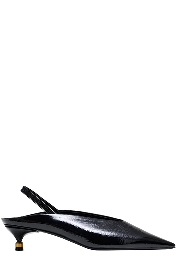Vanda Novak heeled sandals in black made from leather with golden detail, shown against plaid white background.