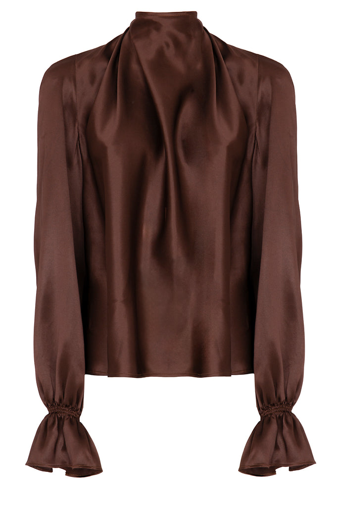 Raquel Diniz halter neck silky top in brown, shown against a plaid white background.