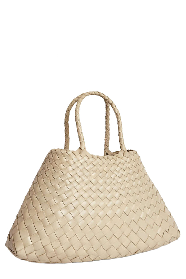 Rotated view of Dragon Diffusion woven leather tote bag in light brown, shown against a plain white background.